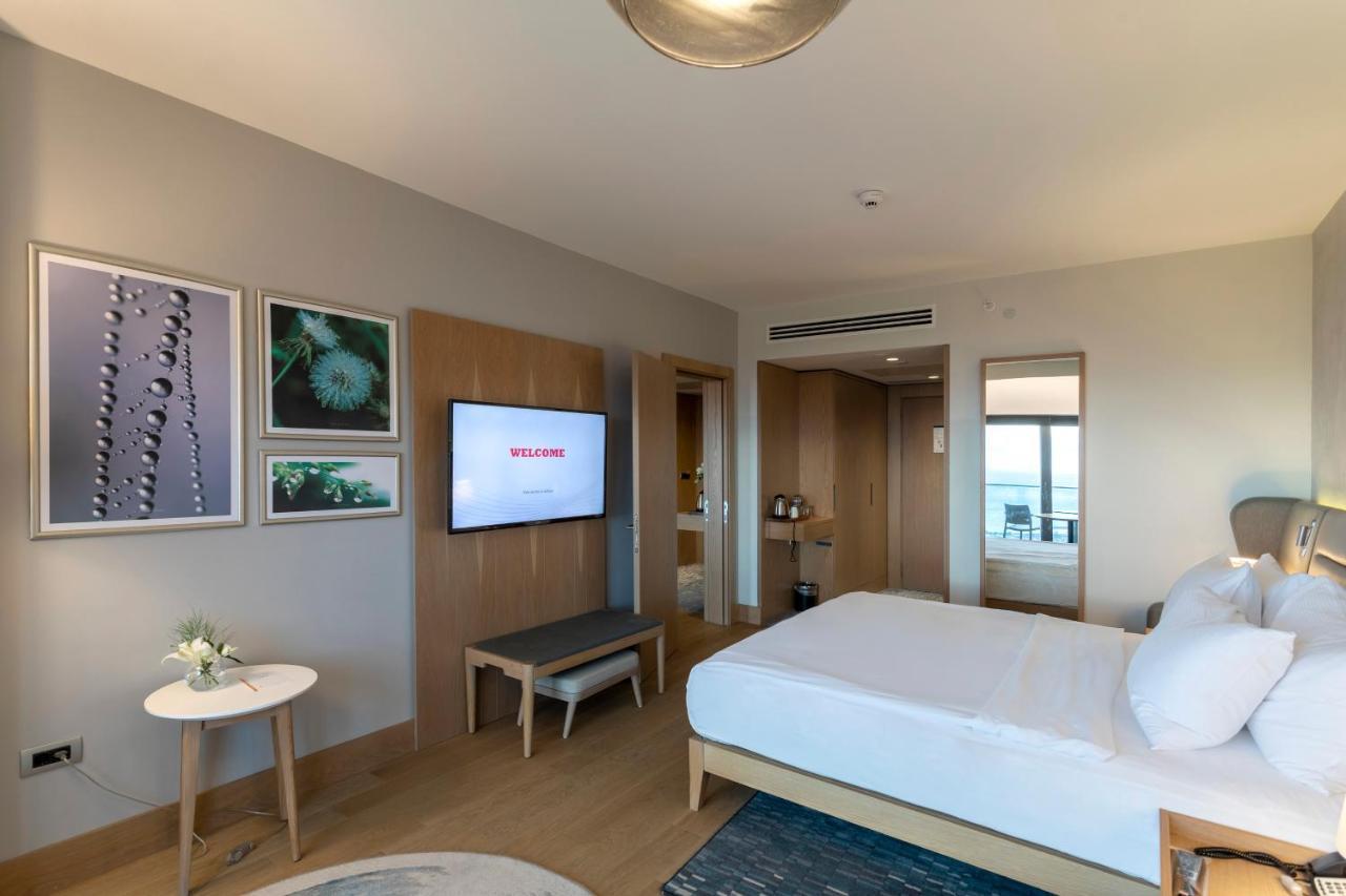 เรดิสัน บลู โฮเต็ล ทรับซอน Hotel ภายนอก รูปภาพ A bedroom at the hotel