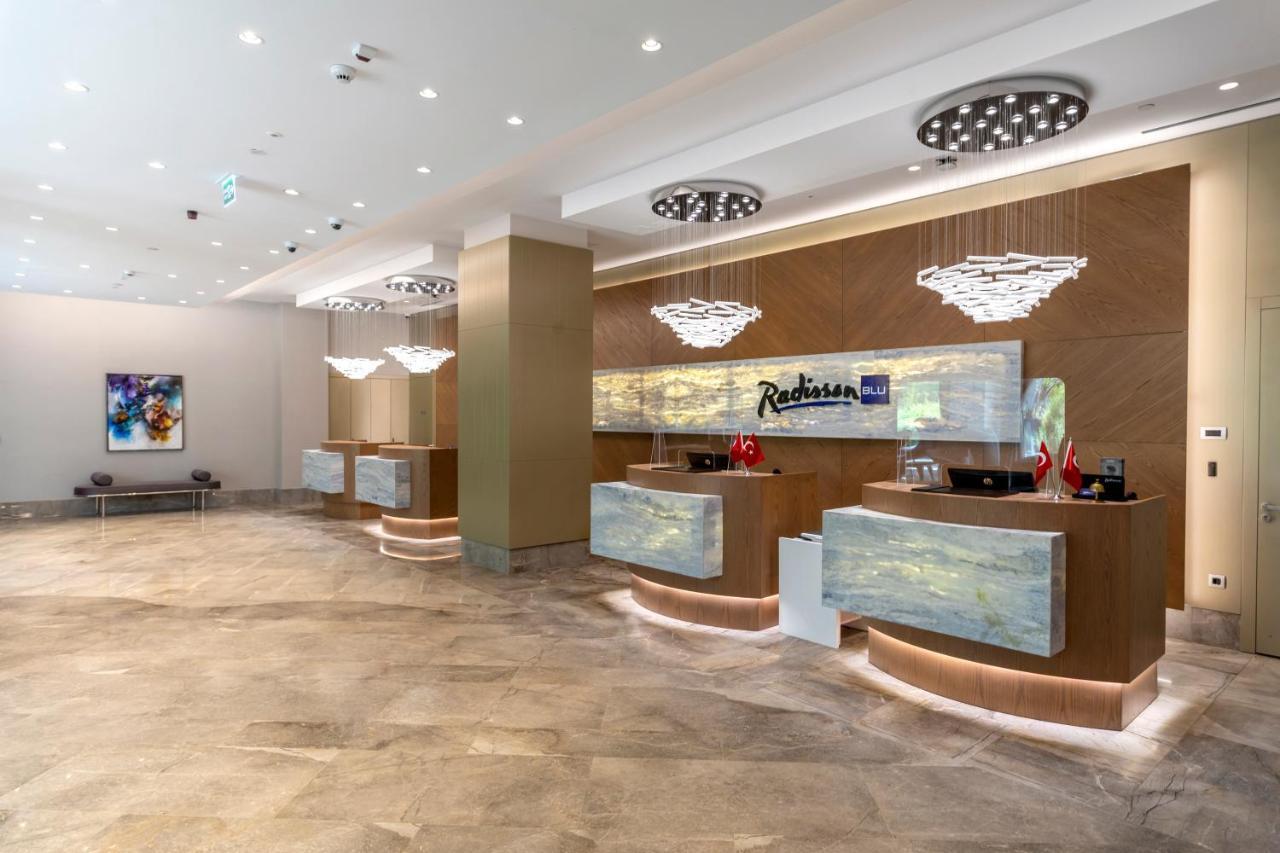 เรดิสัน บลู โฮเต็ล ทรับซอน Hotel ภายนอก รูปภาพ 3D rendering of a hotel lobby