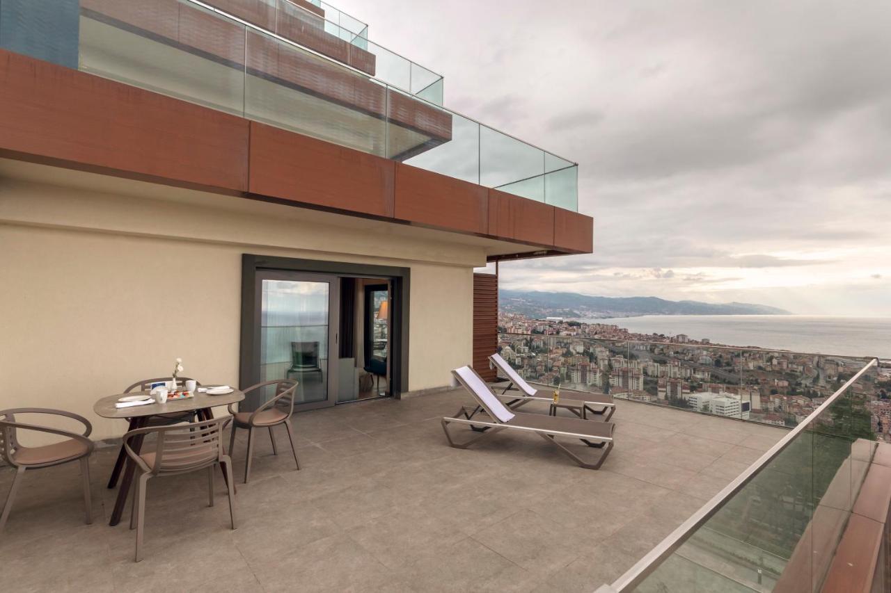 เรดิสัน บลู โฮเต็ล ทรับซอน Hotel ภายนอก รูปภาพ 3D rendering of a balcony